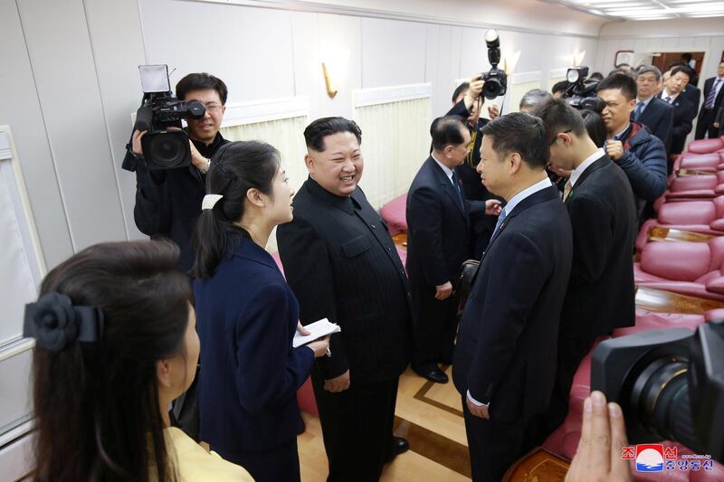 North Korean leader Kim Jong Un smiles as he paid an unofficial visit to Beijing, China. KCNA / via Reuters