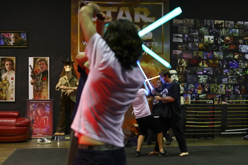 SYDNEY, AUSTRALIA - JUNE 27:   Saberdyne sabers are used by students as they take part in a training class at the Sons of Obiwan Saber Academy on June 27, 2017 in Sydney, Australia. The Sons of Obiwan Saber Academy is a volunteer organisation of Star Wars fans who use stage combat as a way to promote fun, fitness and education. The Australian designed and manufactured lightsabers used in classes are made from aluminium with poly-carbonate blades.  (Photo by Mark Kolbe/Getty Images)