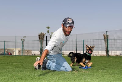 Ras Al Khaimah, United Arab Emirates - March 28th, 2018: Lamar (the dog) with Karam George. A dog park will be opening soon in RAK by Ras Al Khaimah Animal Welfare Centre. They are also organising a three-month campaign to treat and rehome stray cats and dogs in the emirate. Wednesday, March 28th, 2018. Animal Welfare Centre, Ras Al Khaimah. Chris Whiteoak / The National