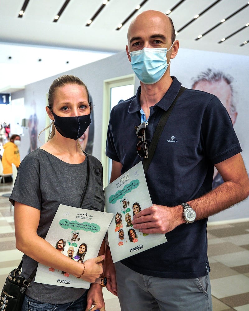 Abu Dhabi, United Arab Emirates, January 12, 2021. SEHA Vaccination Centre at the Abu Dhabi Cruise Terminal area.  Suzana and husband Novica Ristovic get vaccinated.
Victor Besa/The National
Section:  NA
Reporter:  Shireena Al Nowais