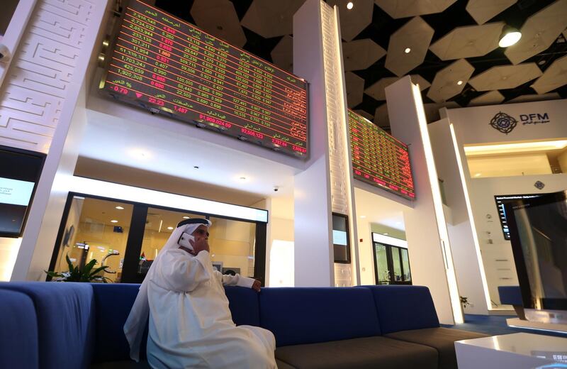 epa07025683 Traders gather at the stock exchange at the Dubai Financial Market, in Dubai, United Arab Emirates, 16 September 2018. Dubai Financial Market General Index (DFMGI) dropped by 1.27 percent.  EPA/ALI HAIDER