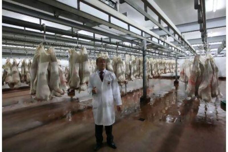 Dr Najdat Nour, the head of veterinary control for the municipality's public health division, at the government-operated slaughterhouse in Al Mina.