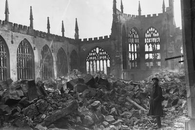 16th November 1940: A man stands in the ruins of Coventry Cathedral after a German nighttime air-raid destroyed the centre of the city.  (Photo by George W. Hales/Fox Photos/Getty Images)