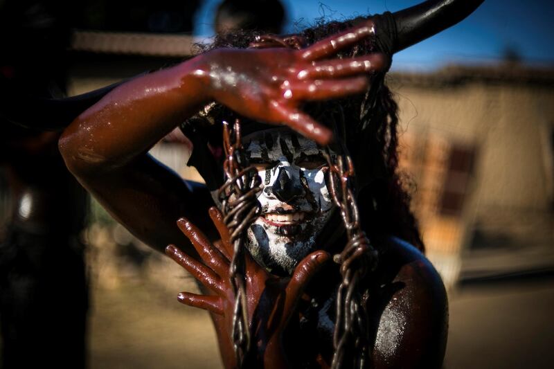 A participant covered with burned oil and wearing masks participates in their traditional carnival celebrations which announces the eve of the religious festivities of Lent in San Martin Tilcajete, in the state of Oaxaca, Mexico. With dances, games and traditions in which the beginning of the 40 days is prepared in which meat can not be eaten carnivals, festivities that in Oaxaca always take a touch of their traditional culture.  EPA