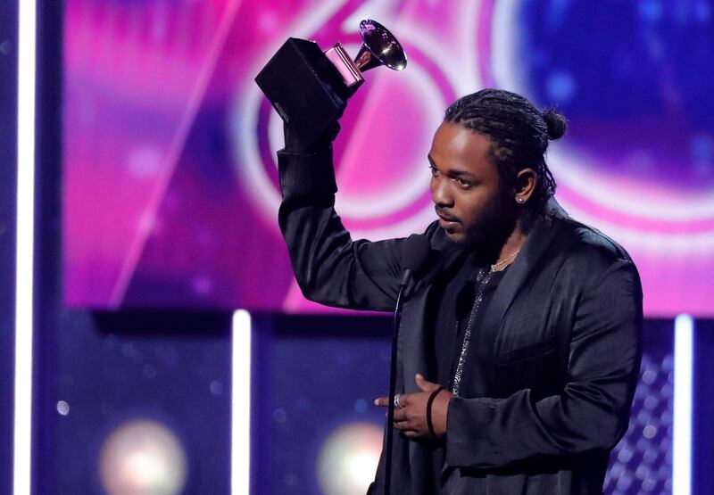 Kendrick Lamar accepts the best rap album Grammy for 'Damn.' Reuters