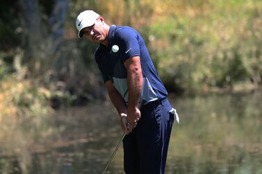 Brooks Koepka chips onto the third green during the first round of the Portland Invitational LIV Golf tournament in North Plains, Ore. , Thursday, June 30, 2022.  (AP Photo / Steve Dipaola)