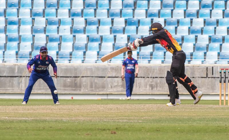 Chad Soper of Papua New Guinea hits out on his way to 36  not out off 53 balls.