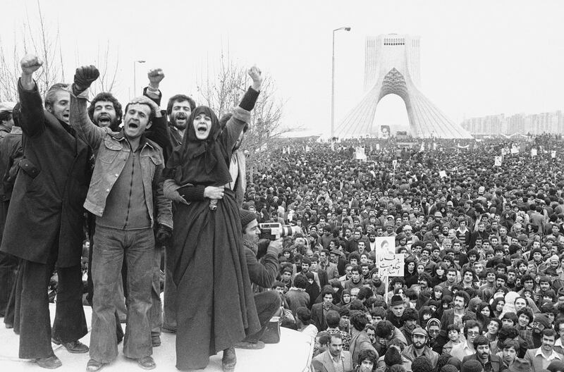 FILE - In this Jan. 19, 1979 file photo, more than a million supporters of an Islamic Republic assembled around the Shayad monument, in Tehran, Iran. Wednesday, Jan. 16, 2019 marks the 40th anniversary of the shah abandoning his Peacock Throne and leaving his nation for the last time in his life, setting the stage for the country's 1979 Islamic Revolution only a month later. (AP Photo/Aristotle Saris, File)