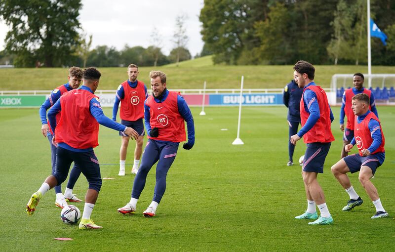 Left to right: England's John Stones, Jadon Sancho, Jordan Henderson, Harry Kane, Ben Chilwell, Raheem Sterling and Kieran Trippier during at St George's Park ahead of their upcoming World Cup qualifers. PA