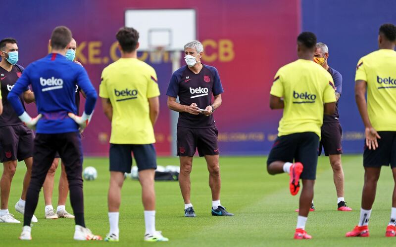 Barcelona manager Quique Setien leads his team's training session at Joan Gamper sports city. EPA