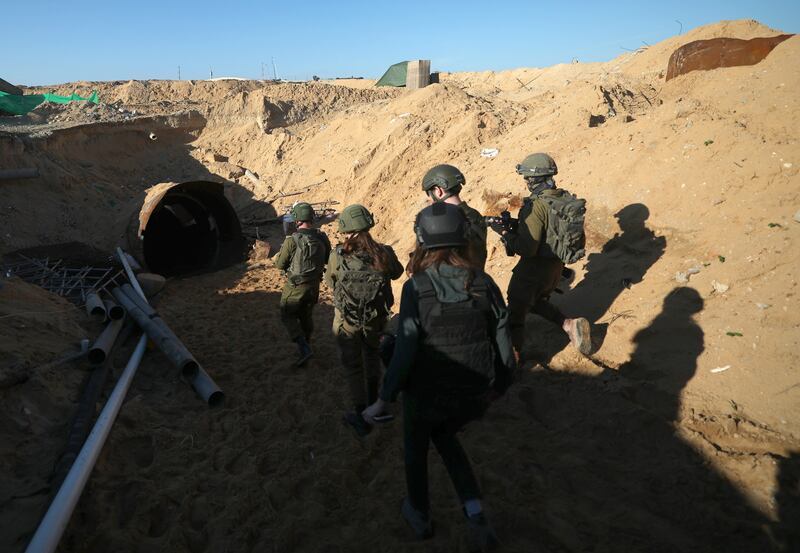 Israeli soldiers at the entrance of a tunnel 400 metres from the Erez crossing between Gaza and Israel, in the Palestinian town of Beit Hanun. EPA