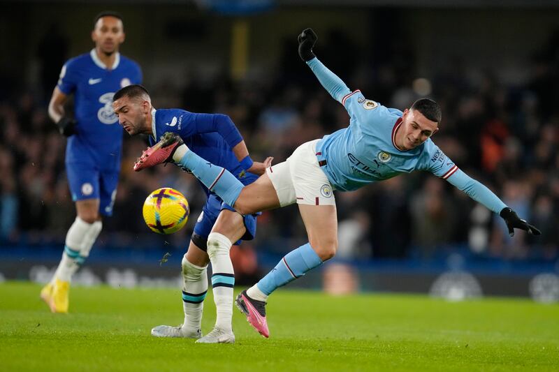 Manchester City's Phil Foden and Chelsea's Hakim Ziyech. AP 