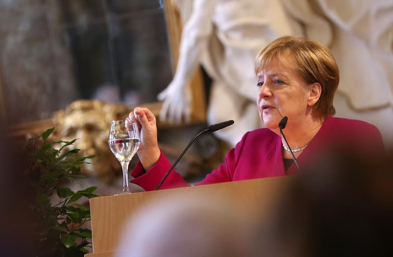 German Chancellor Angela Merkel gives a speech at the Benedictine abbey in Ottobeuren, southern Germany, where is taking place a symposium on European policy on September 30, 2018. Merkel is in the southern state of Bavaria to support her conservative CDU's sister party, the Christian Social Union (CSU), ahead of a regional election to take place on October 14, 2018. - Germany OUT
 / AFP / dpa / Karl-Josef Hildenbrand
