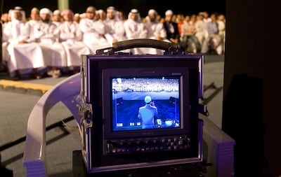 Dubai - August 27, 2009 - Dr. Zakir Naik can be seen on the TV monitor as he speaks before 15,000 people at the Dubai Airport Expo Center in Dubai August 27, 2009.  (Photo by Jeff Topping/The National)  *** Local Caption ***  JT008-0827-DR. ZAKIR NAIK_MG_0707.jpg
