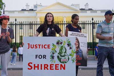A woman at a vigil for Palestinian-American journalist Shireen Abu Akleh outside the White House. Willy Lowry / The National
