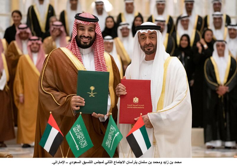 ABU DHABI, UNITED ARAB EMIRATES - November 27, 2019: HH Sheikh Mohamed bin Zayed Al Nahyan, Crown Prince of Abu Dhabi and Deputy Supreme Commander of the UAE Armed Forces (R) and HRH Prince Mohamed bin Salman bin Abdulaziz, Crown Prince, Deputy Prime Minister and Minister of Defence of Saudi Arabia (L), stand for a photograph after signing the minutes of the Saudi-Emirati Coordination Council during a state visit, at Qasr Al Watan. ( Ryan Carter for the Ministry of Presidential Affairs )---