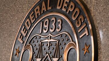 The seal of the Federal Deposit Insurance Corporation at its headquarters in Washington. Bloomberg