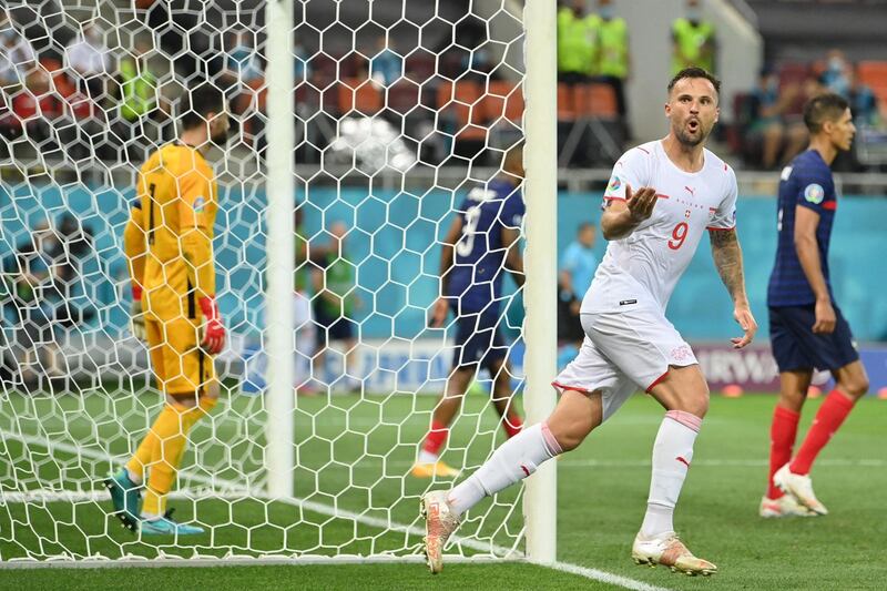 Switzerland's Haris Seferovic celebrates scoring the team's second goal. AFP