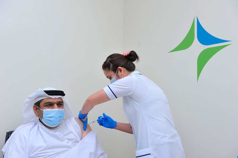 Amer Sharif, head of Dubai's Covid-10 Command and Control Centre, receives his first dose of the Pfizer-BioNTech vaccine. Courtesy: Dubai Media Office