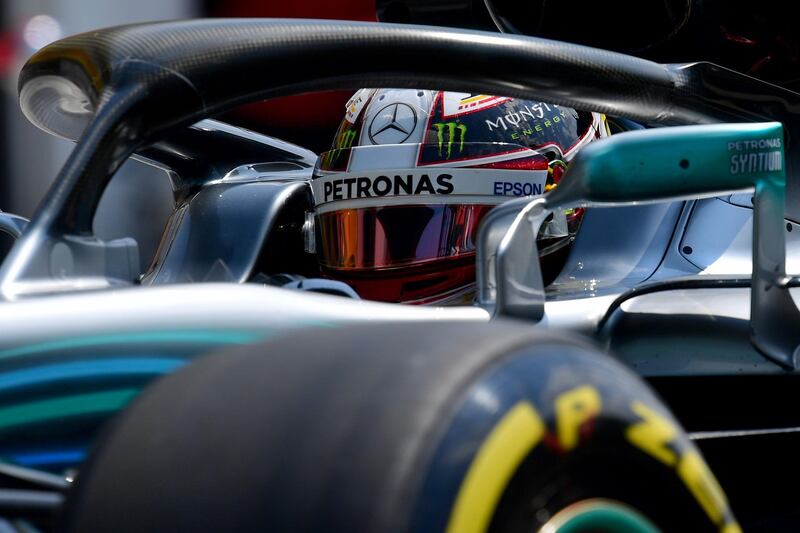 Mercedes' British driver Lewis Hamilton steers his car out of the pit lane during the first free practice session ahead of the Formula One Hungarian Grand Prix at the Hungaroring circuit in Mogyorod near Budapest, Hungary, on July 27, 2018.  / AFP / ANDREJ ISAKOVIC

