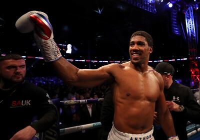 LONDON, ENGLAND - SEPTEMBER 22:  Anthony Joshua celebrates victory after the IBF, WBA Super, WBO & IBO World Heavyweight Championship title fight between Anthony Joshua and Alexander Povetkin at Wembley Stadium on September 22, 2018 in London, England.  (Photo by Richard Heathcote/Getty Images)