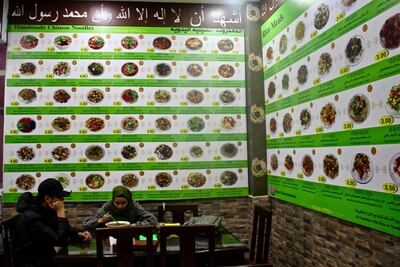 The Islamic Chinese Restaurant's menu is also splashed across the walls. Miriam Berger