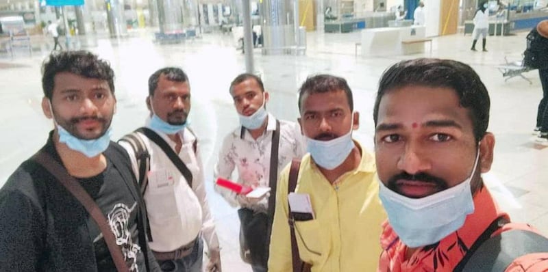Workers and families return to India on private flights organised last year by a Dubai businessman with volunteers from the UAE. They are part of a newly launched group called Rescuing every distressed Indian overseas (Redio) that will help Indians in need across the globe return home. Courtesy: Dhanashree Patil