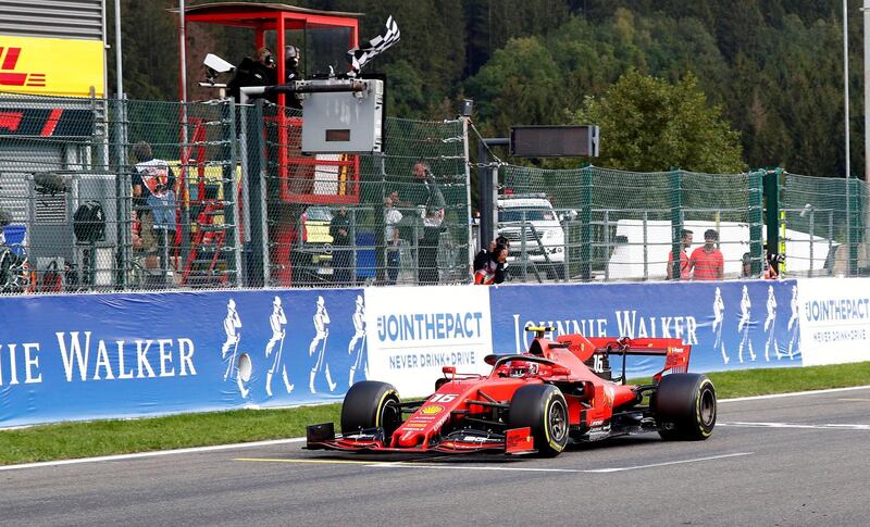 Formula One F1 - Belgian Grand Prix - Spa-Francorchamps, Stavelot, Belgium - September 1, 2019  Ferrari's Charles Leclerc takes the chequered flag to win the race   REUTERS/Francois Lenoir