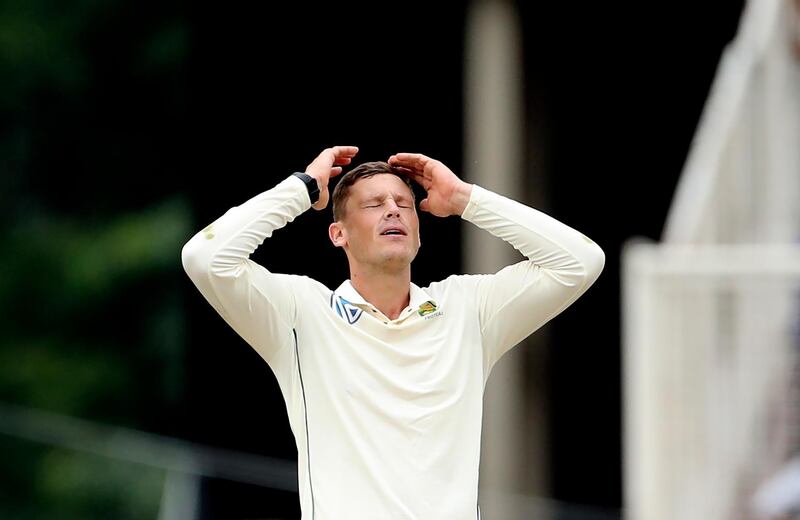 South Africa's George Linde after being hit for a boundary by India batsman Umesh Yadav. AP