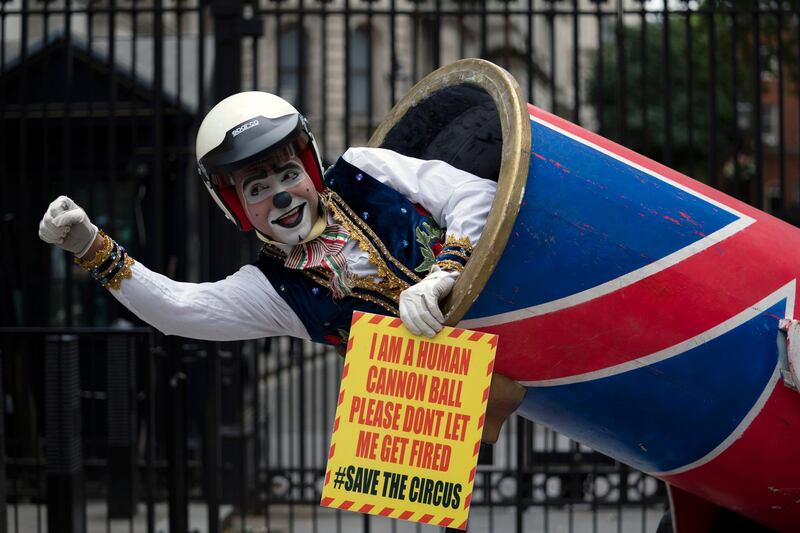 Circus performers of the Association of Circus Proprietors outside Downing Street, London. The association handed a petition to Downing Street asking British Prime Minister Boris Johnson to allow circuses to reopen.  EPA