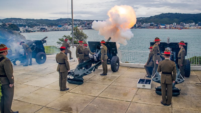 The Royal Regiment of New Zealand Artillery fires field guns at Point Jerningham, to mark the 70th anniversary of the coronation of Queen Elizabeth II, in Wellington, New Zealand. AP