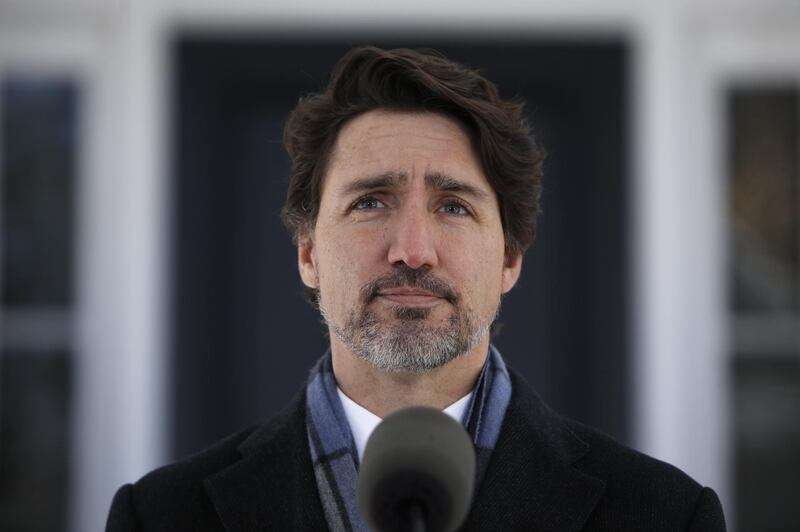Justin Trudeau, Canada's prime minister, pauses during a news conference outside Rideau Cottage in Ottawa, Ontario, Canada, on Monday, April 20, 2020. Trudeau said that the death toll from the mass shooting in Nova Scotia last weekend has risen to 18, the National Post reported. Photographer: David Kawai/Bloomberg