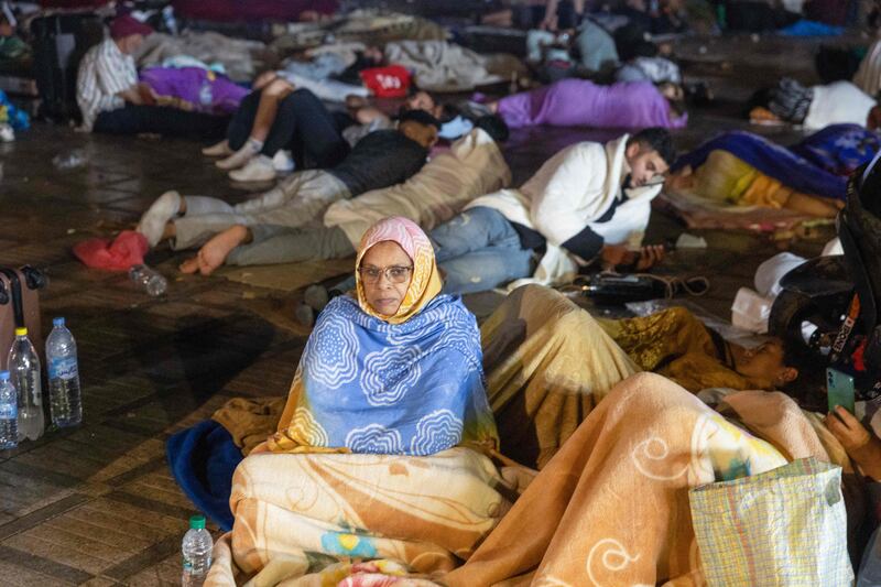 Residents take shelter outside at a square following an earthquake in Marrakesh on Friday. AFP