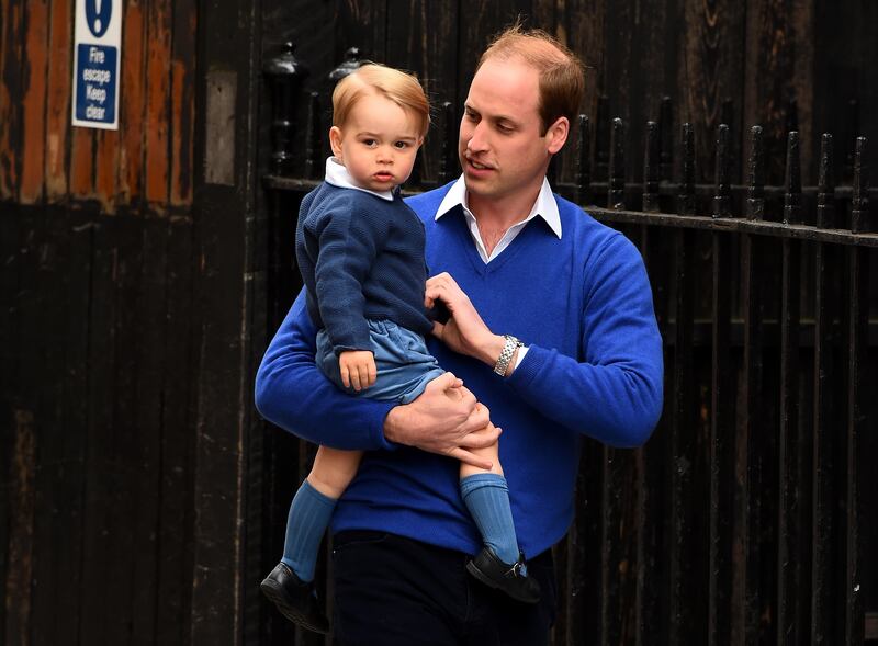 Prince William arrives with his son Prince George at St Mary's Hospital in London on the day Princess Charlotte was born in May 2015. Getty Images