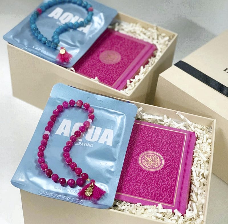 Inna Carton, a specialised gifting service, sells boxes featuring handmade rosary beads with charms and tassels 