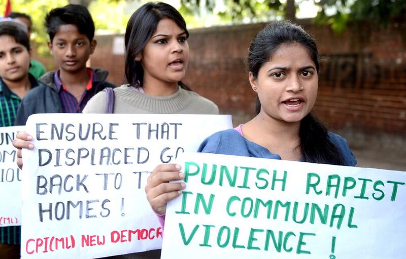 Supporters of the Communist Party of India shout slogans during a demonstration against a gang rape in Muzafarnagar in New Delhi. Raveendran / AFP