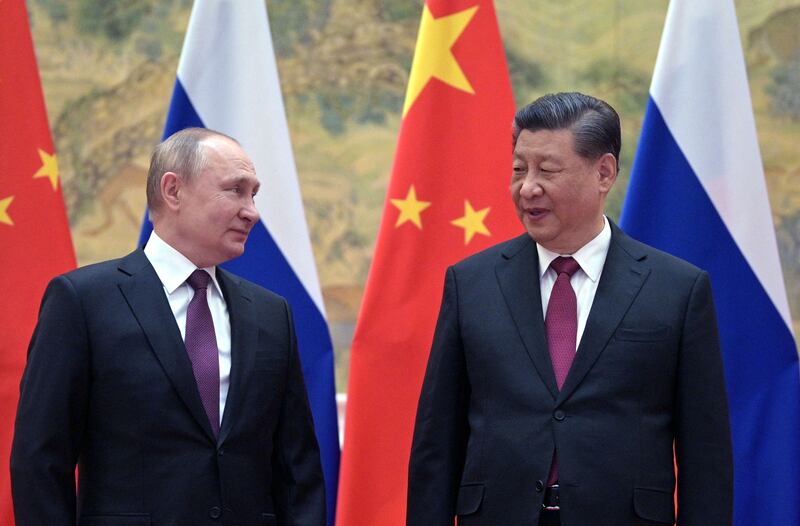 Russian President Vladimir Putin and Chinese President Xi Jinping in Beijing before Russia's invasion of Ukraine in February 2022. AFP