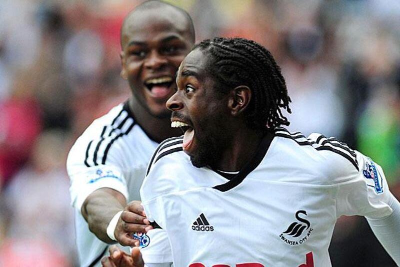 The Swans went on to complete a 3-0 win over West Brom with Nathan Dyer, in front, and Leroy Lita also getting on the scoresheet at the Liberty Stadium.

PA / AP Photo