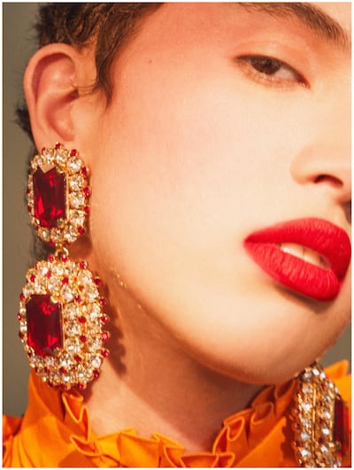 Haute Harlequin. Photography | david vail | 
fashion director | Sarah Maisey

Dress, Dh26,420, Hermès. Earrings, Dh4,700, Dolce & Gabbana