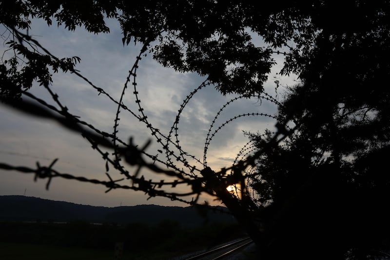 PAJU, SOUTH KOREA - SEPTEMBER 03: Barbed wire fence at the Imjingak, near the Demilitarized zone (DMZ) separating South and North Korea on September 3, 2017 in Paju, South Korea. South Korean, Japan and U.S. detected an artificial earthquake from Kilju, northern Hamgyong Province of North Korea. State news agency KCNA announced Pyongyang have successfully carried out a test of a hydrogen bomb, which could be loaded to the Intercontinental Ballistic Missile (ICBM) missile. (Photo by Chung Sung-Jun/Getty Images)