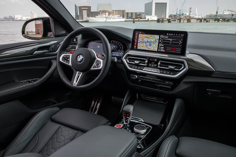 The cabin has a 12.3-inch Live Cockpit Pro digital instrument cluster and a 12.3-inch touchscreen infotainment system running on BMW's latest iDrive 7 software.