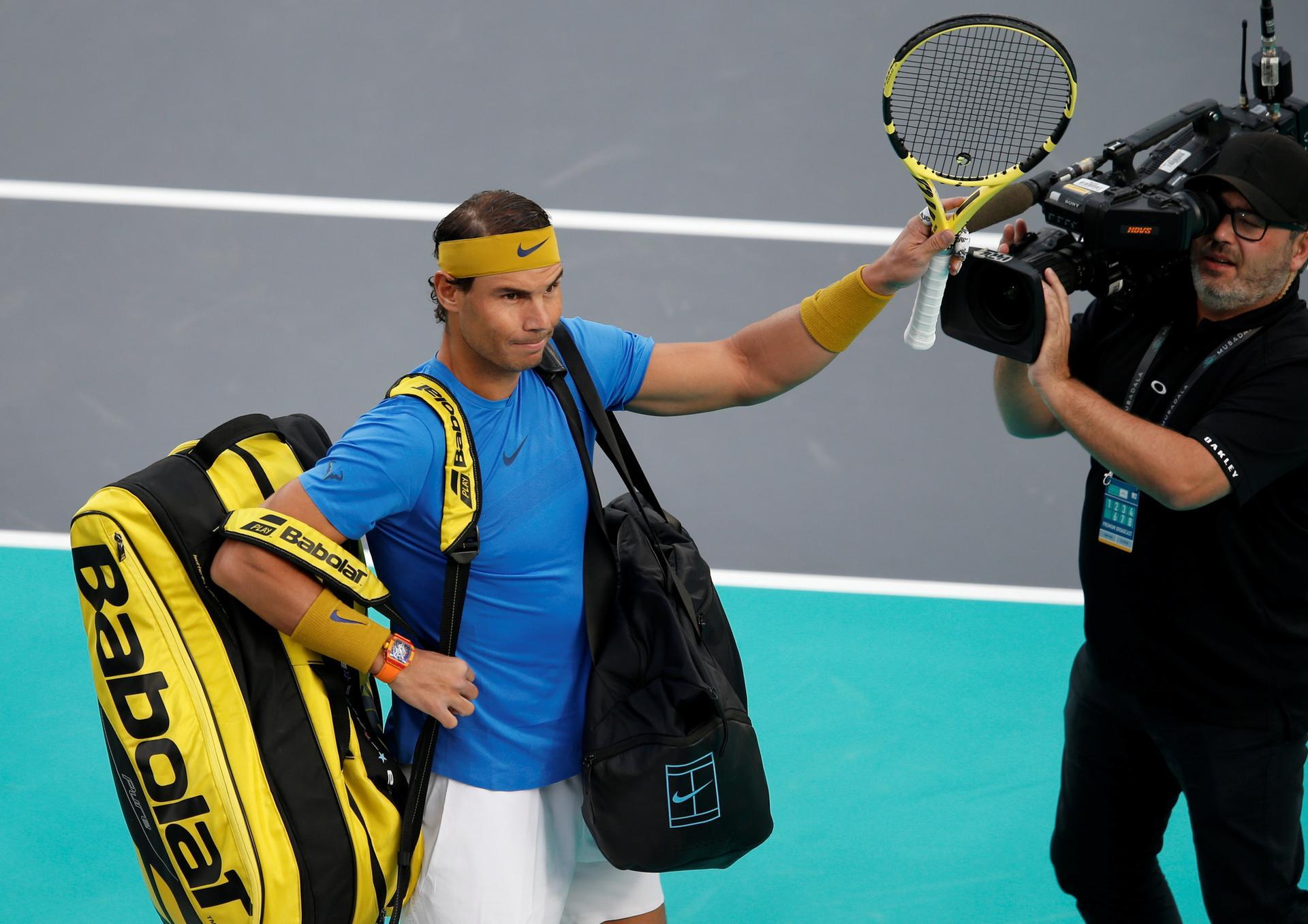 Rafael Nadal  acknowledges fans before his semi-final match against Kevin Anderson at the Mubadala World Tennis Championship 2018 in Abu Dhabi. EPA