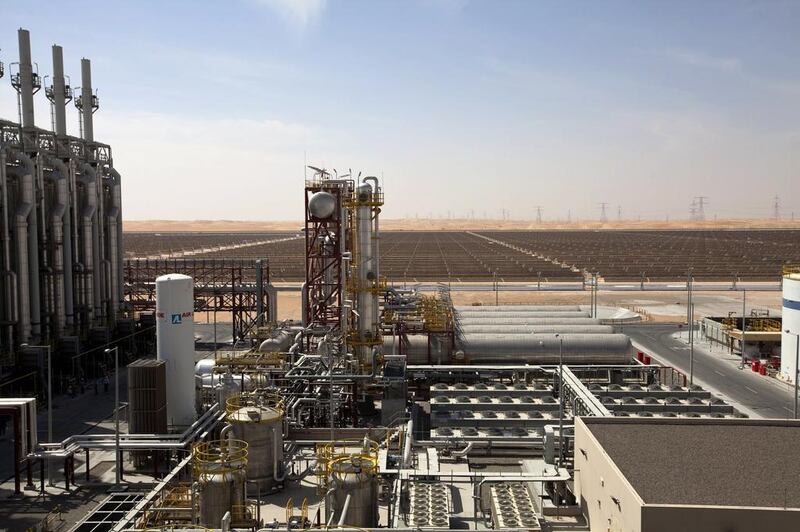 Above, the Shams 1 solar power station near Madinat Zayed in Abu Dhabi. The UAE has been actively pursuing green-energy projects. Christopher Pike / The National