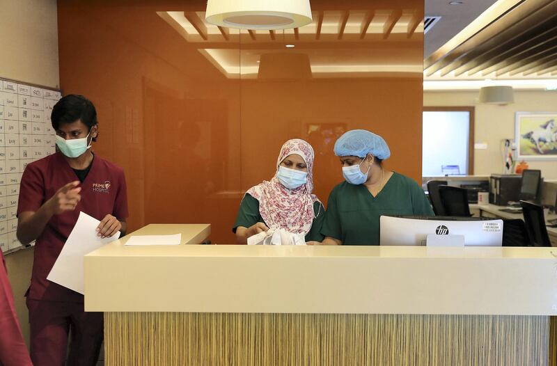 DUBAI, UNITED ARAB EMIRATES , April 26– 2020 :- Medical staff working at the reception of the COVID-19 patients ward at the Prime Hospital on airport road in Al Garhoud in Dubai . (Pawan Singh / The National) For News/Standalone/Online/Instagram/Stock.  Story by Nick Webster