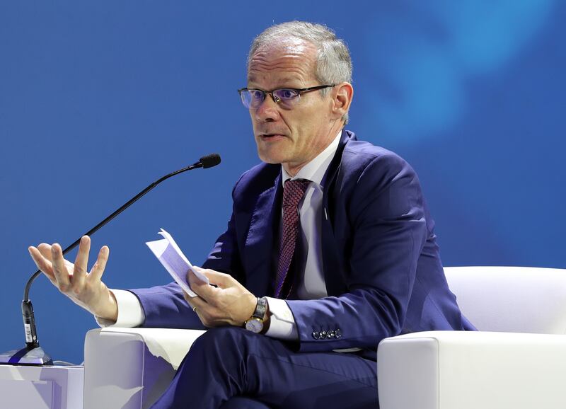 Nicolas Terraz, member of the executive committee, president of exploration and production at Total Energies, addresses a panel discussion on 'Transitioning to New Energy Supply and Demand Needs: a Look into the Future' at Adipec 2022. Chris Whiteoak / The National