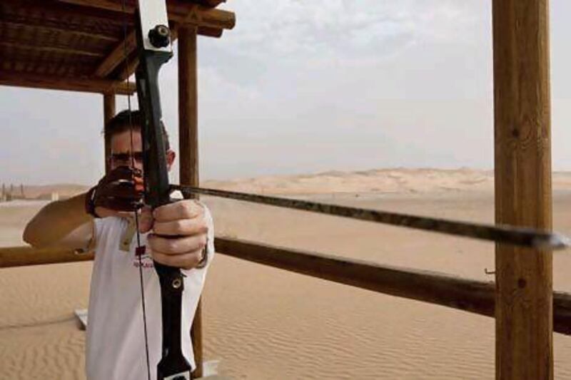 Andries Dreyer, an activities guide at Qasr Al Sarab, does his best to give hotel guests a good time.
