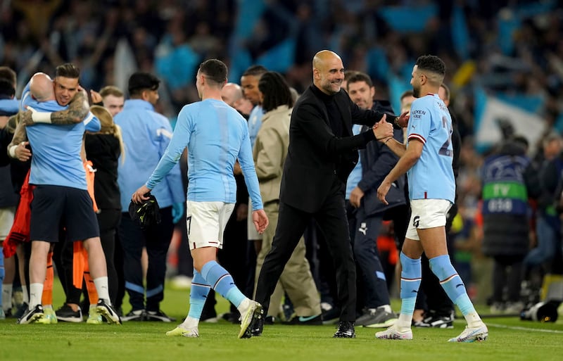 Pep Guardiola celebrates with Riyad Mahrez and the rest of the Manchester City players and staff after reaching the Champions League final. PA