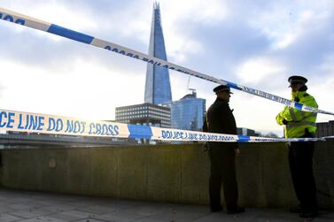 Police officers patrol London Bridge, where knife attacker Usman Khan was killed on Friday. AP