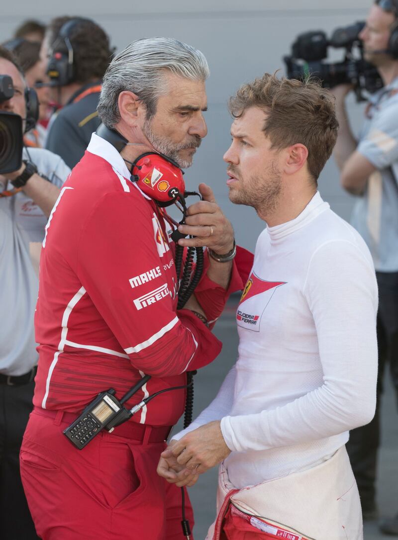 Sebastian Vettel, right, with Ferrari chief Maurizio Arrivabene, has come in for heavy criticism after colliding with Lewis Hamilton in Azerbaijan. (Valdrin Xhemaj  /Pool via AP)