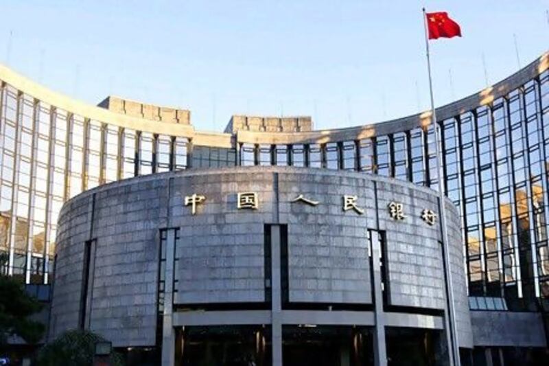 The headquarters of the People's Bank of China in Beijing. The bank has enough scope for monetary easing should conditions deteriorate. Xinhua via AP Photo